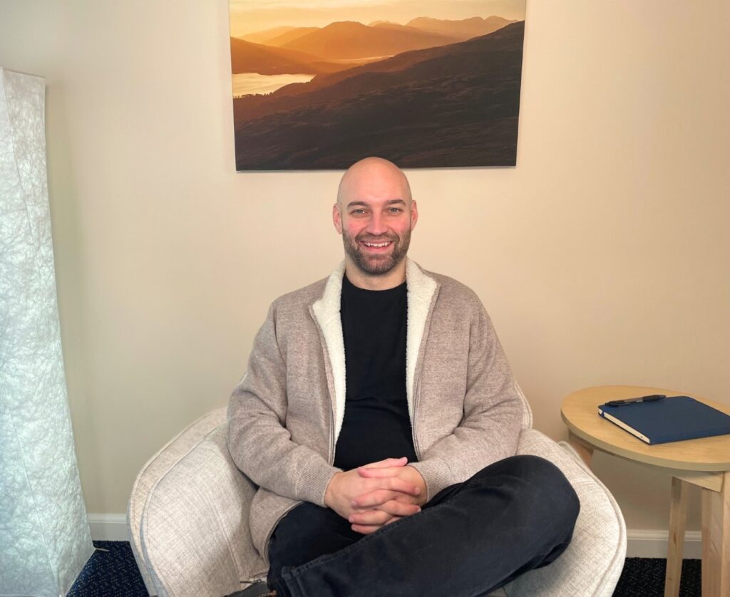 Chris in a therapy room in Stirling
